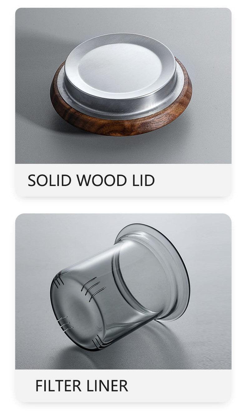 https://juglana.de/cdn/shop/files/heat-resistant-tea-mug-or-wood-lid-metal-infuser-or-toned-glass-juglana-7.jpg?v=1690134929